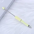 Customizable light yellow DIY beaded ballpoint pen with a long metal rod for craft beads - Bullet Tip 1.0mm / Milky Yellow