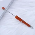 Elegant brown DIY beadable ballpoint pen for creative handmade jewelry making projects - 1.0mm Bullet Tip / Amber Orange