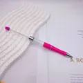 Pink DIY beadable pen with a long metal rod and clear tube for custom bead designs - 1.0mm Bullet Tip / Fluorescent Rose Red