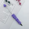 Exquisiter lila Perlenstift mit 3D-Schleifen-Anhängern und zarten Perlenakzenten für Geschenke - Lila