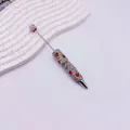 Élégant stylo à bille perlage avec des strass AB étincelants et cœurs rouges - Rouge