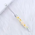 Bolígrafo de cuentas DIY con diseño de girasoles amarillos y acabado plateado mate - Estilo Margarita Beige