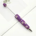 Bolígrafo creativo morado para cuentas DIY con elegantes motivos florales de margaritas. - Punta de bala de 1,0 mm / Púrpura