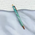 Elegant metal ballpoint pen featuring turquoise marble pattern with rose gold accents. - 1.0mm Bullet Tip / Dark Green