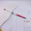 Elegant pink DIY beadable ballpoint pen with transparent tube and silver rotating tip - 1.0mm Bullet Tip / Mocha Coffee