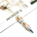 Halloween DIY beaded ballpoint pen with sparkling crystals and cute pumpkin charms - White Pumpkin Lantern