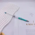Elegant cyan DIY empty tube beaded ballpoint pen with silver rotating hardware detail - 1.0mm Bullet Tip / Candy Light Blue