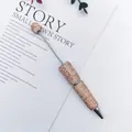 Luxury champagne gold AB rhinestone ballpoint pen for elegant writing and DIY gifts. - 1.0mm Bullet Tip / AB Champagne Gold