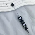 Elegant DIY beaded pen featuring full black rhinestones and dainty white bow charms - White Purple Bow / Bullet Tip 1.0mm