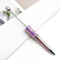 Pink metallic DIY beaded ballpoint pen featuring purple star sequins and rotating tip - 1.0mm Bullet Tip / Pink