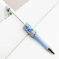 Blue DIY beaded ballpoint pen featuring colorful star sequins and metallic tip detail - 1.0mm Bullet Tip / Aqua Blue