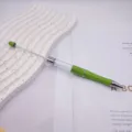 Green DIY beadable pen with a long metal rod and transparent empty tube for crafting - 1.0mm Bullet Tip / Holographic Green