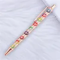 Elegant rose gold ballpoint pen featuring gold glitter and colorful lip patterns on the barrel - Lip Print Rose Gold (Rose Gold Parts) (52)