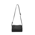 Minimalist black PU leather pillow bag with adjustable strap and silver zipper details - Black