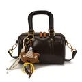 Minimalist dark brown glossy leather Boston bag with double zippers and a cute bear charm. - Coffee