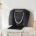 Luxuriöse Schmuckschatulle aus schwarzem Samt für Perlenketten, ideal als Geschenk - Schwarz