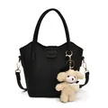 Elegant black lychee grain bucket bag with cute cream teddy bear accessory. - Bag Only (No Charm) / Black
