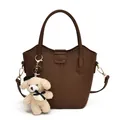 Classic brown pebble leather bucket bag with a cute plush bear keychain accessory charm - Bag Only (No Charm) / Coffee