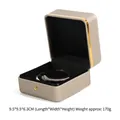 Elegante Schmuckschatulle aus champagnerfarbenem PU-Leder mit Goldrand für Armbänder - Schnappverschluss-armbandbox / Gold