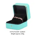 Schmuckschatulle aus tiffanyblauem PU-Leder mit Goldrand und schwarzem Samtkissen - Uhren- und Armbandbox / Tiffany-Blau