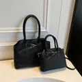 Vintage black ribbed leather handbags with decorative buckles in two sizes for women - S / Black