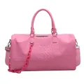 Detailed view of pink crocodile texture leather duffel bag with chunky chain decoration - Pink