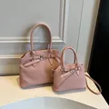 Elegant pink textured leather handbags with buckle strap detail, set of two sizes - S / Pink