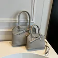 Elegant retro beige pleated handbags set featuring decorative buckle straps and silver hardware - S / Gray