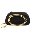 Detail view of matte black evening clutch bag with gold metallic hardware and chain - Black