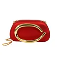 Elegant red evening clutch bag with large gold metal handle and long chain strap - Red