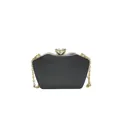 Sleek black acrylic dinner clutch bag with gold chain strap and crystal clasp detail - Black