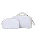 Detail view of a white fuzzy sherpa makeup bag set featuring premium gold zippers - White