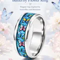 Macro view of colorful butterfly and flower pattern on a stainless steel ring - Size 6 / Blue Butterfly