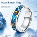 Detailed view of stainless steel ocean ring with dolphin and coral pattern - Size 6 / Ocean Dolphin