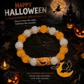 Detailed view of Halloween themed beaded bracelet with orange crescent bat pendant. - Halloween Moon Witch Style / Single Piece