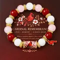 Handmade cardinal memorial beaded bracelet with red, pink and white beads on a gift card. - Red Bird Style / With Card / Red