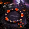 Halloween crystal beaded bracelet with purple and orange beads and spooky castle charm. - Halloween Castle Style / Single Piece