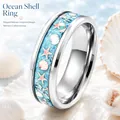 Elegant marine-inspired stainless steel ring with seashell and starfish blue inlay - Size 6 / Starfish Shell