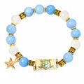 Boho sea turtle beaded bracelet with light blue stones and a golden starfish charm for women - Sea Turtle