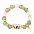 Handmade elastic beaded bracelet featuring hummingbird porcelain and an eagle charm - Green Bird Style / Single Piece