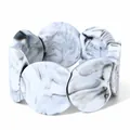 Elastic irregular round resin bracelet with a luxury black and white marble texture - White with Black Silk Texture