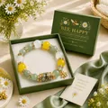 Detailed view of the bee themed beaded lucky bracelet in green gift box packaging. - Green Bee Style / Color Box Packaging