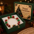 Detail of a Christmas themed beaded bracelet with a festive tree pendant in a gift box. - Christmas Tree Style (Boxed) / Single Piece
