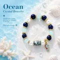 Mythical ocean DIY bead bracelet featuring blue and green crystals and a seahorse charm - Blue Seahorse