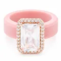 Roze siliconen ring met een grote rechthoekige zirkonia en een roségouden zetting. - Maat 6 / Roze