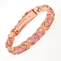 Elegantes magnetisches Armband in Roségold mit rosa herzförmigen Steinen und Kristallen - Gekreuztes Herz / Roségold Rosa Strass
