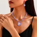 Handgefertigtes Schmuckset mit lila Fimo-Blumenanhänger und Perlenohrringen für Damen im Set - Lila