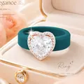 Elegante groenblauwe siliconen ring met grote hartvormige zirkoon halo zetting in doos - Pauwgroen