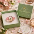 Elegant pink hummingbird cuff bracelet displayed in a spring garden theme gift box - Green Bird Style / Size 7 (Boxed) / Pink