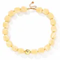 Chunky acrylic beaded necklace in cream yellow with central gold sphere for summer outfits - Beige Round Bead
